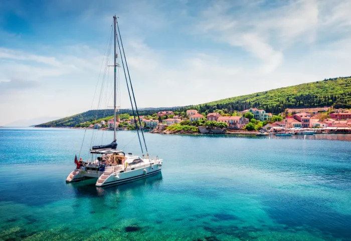 beautiful view of fast catamaran and shore