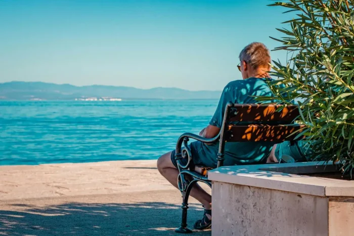 man looking at the sea in Lovran